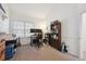 Office featuring natural light, neutral walls, built-in shelving, and ample storage space at 5875 W Asbury Pl, Lakewood, CO 80227