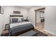 Charming bedroom with stylish decor and a dark wood accent at 11511 E 118Th Ave, Commerce City, CO 80640