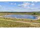 Aerial view of a community pond at 527 Antelope E Dr, Bennett, CO 80102