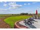 Relaxing backyard with comfortable lounge chairs and manicured lawn perfect for outdoor enjoyment at 527 Antelope E Dr, Bennett, CO 80102