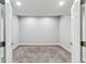 Neutral walls, carpeted floors and an open doorway is featured in this bedroom at 527 Antelope E Dr, Bennett, CO 80102