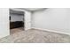 This bedroom features neutral walls, carpeted floors and an open doorway at 527 Antelope E Dr, Bennett, CO 80102