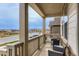 Relaxing front porch with comfortable seating, offering a scenic view of the neighborhood at 17786 Olive St, Broomfield, CO 80023