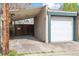 Covered carport and garage, showing the access and parking features of the property at 3647 Jason St, Denver, CO 80211