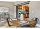 Cozy dining room featuring a round table with views of the kitchen at 3647 Jason St, Denver, CO 80211