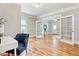 Bright office space featuring hardwood floors and French doors leading to the living room at 3647 Jason St, Denver, CO 80211
