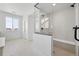 Bright bathroom with tiled shower, glass partition, and modern fixtures at 16565 Black Rose Cir, Parker, CO 80134