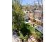 Aerial view of backyard with patio, firepit, storage shed, and grassy lawn at 2517 W 44Th Ave, Denver, CO 80211