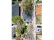 Aerial view of a home showing the backyard layout with patio, firepit, and landscaping at 2517 W 44Th Ave, Denver, CO 80211