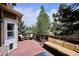 Inviting outdoor deck with comfortable seating and serene views of the surrounding landscape at 9524 E Caley Cir, Englewood, CO 80111