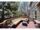 Spacious deck with outdoor furniture, providing ample space for relaxation and entertainment at 9524 E Caley Cir, Englewood, CO 80111