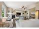 Inviting living room with a fireplace, neutral furniture, and stylish decor at 9524 E Caley Cir, Englewood, CO 80111