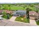 Charming home with well-manicured lawn, complemented by the lush greenery of the surrounding landscape at 8732 W Arbor Ave, Littleton, CO 80123