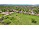 Overhead shot of a house's location near open field with some green trees at 8732 W Arbor Ave, Littleton, CO 80123