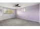Bright bedroom featuring neutral tones, natural light, and carpeted floor at 8732 W Arbor Ave, Littleton, CO 80123