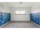 Spacious bedroom with white walls, carpet flooring, and blue trim at 8732 W Arbor Ave, Littleton, CO 80123
