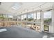 Sunroom with expansive views, skylight, and access to backyard and lower level at 8732 W Arbor Ave, Littleton, CO 80123