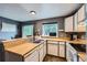 Functional kitchen and dining space with access to a private outdoor area, perfect for entertaining at 9672 W Chatfield Ave # C, Littleton, CO 80128