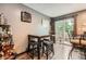 Cozy dining area featuring a high top table with bar stools, perfect for casual meals and gatherings at 9672 W Chatfield Ave # C, Littleton, CO 80128