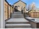 Stairs leading up to a backyard patio and detached garage at 1024 5Th St, Golden, CO 80403