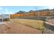 Backyard featuring a lawn and gravel area with privacy fence at 114 S Edge Cliff St, Castle Rock, CO 80104