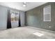 Spacious bedroom featuring a ceiling fan and great natural light from two large windows at 114 S Edge Cliff St, Castle Rock, CO 80104