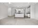 Bright, open-concept living space with a view of the kitchen at 114 S Edge Cliff St, Castle Rock, CO 80104
