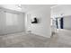 Neutral living room featuring a view of the bright kitchen area at 114 S Edge Cliff St, Castle Rock, CO 80104