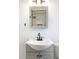 Nicely appointed bathroom with modern vanity and tiled shower at 1213 Jamaica St, Aurora, CO 80010
