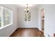 Bright dining room with natural light and hardwood floors at 1213 Jamaica St, Aurora, CO 80010