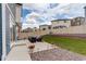 Well-maintained backyard with outdoor seating and landscaping at 4444 N Picadilly Ct, Aurora, CO 80019