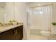 Bathroom featuring granite counters, a vanity with a sink, a shower, and a bathtub at 4444 N Picadilly Ct, Aurora, CO 80019