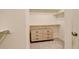 Walk-in closet with built-in shelving and plenty of storage space at 4444 N Picadilly Ct, Aurora, CO 80019