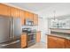 Modern kitchen shows stainless steel appliances with lots of natural lighting at 1495 Blue Sky Way # 9-308, Erie, CO 80516