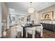 Elegant dining area with modern chandelier and comfortable seating at 2826 Broadway St # 106, Boulder, CO 80304