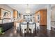Bright dining room with modern lighting fixtures and eat-in kitchen at 2826 Broadway St # 106, Boulder, CO 80304