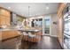Modern kitchen featuring a spacious island with bar seating, stainless steel appliances, and custom cabinets at 2826 Broadway St # 106, Boulder, CO 80304