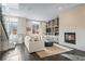 Cozy living room with fireplace, built-ins, and bright natural light at 2826 Broadway St # 106, Boulder, CO 80304