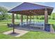 Outdoor picnic area featuring covered seating, grills, and ample space for gatherings at 9771 W Cornell Pl, Lakewood, CO 80227