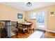 Dining room area with a table and chairs at 30633 Kings Valley Dr, Conifer, CO 80433