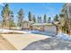 Inviting home showcasing the expansive driveway at 30633 Kings Valley Dr, Conifer, CO 80433