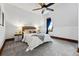 Comfortable bedroom with soft carpet, ceiling fan, and a cozy cottage aesthetic at 1001 E 17Th Ave # 12, Denver, CO 80218
