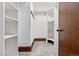 Walk-in closet with built-in shelving and carpeted floor at 1001 E 17Th Ave # 12, Denver, CO 80218