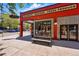 A commercial building featuring a fresh produce market with a bench outside at 1001 E 17Th Ave # 12, Denver, CO 80218