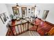 Bright, open-concept living room with hardwood floors and large windows overlooking the street at 1001 E 17Th Ave # 12, Denver, CO 80218