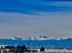 Expansive view of snow-capped mountains, highlighting the area's natural beauty at 10741 Idalia Way, Commerce City, CO 80022