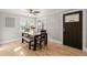 Light and airy dining room featuring a modern ceiling fan and hardwood flooring at 6800 S Pennsylvania St, Centennial, CO 80122