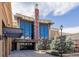 The facade of the Hollywood Theater features large windows and eye-catching signage in an outdoor setting at 6800 S Pennsylvania St, Centennial, CO 80122