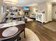 Open concept living space with fireplace, hardwood floors, and comfortable seating at 290 Broken Lance Dr # B104, Breckenridge, CO 80424