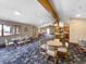 Spacious lounge with comfortable seating and a partial kitchen offering a place to relax and socialize at 290 Broken Lance Dr # B104, Breckenridge, CO 80424
